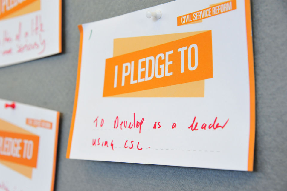 civil service pledge card reading: "to develop as a leader using CSL"