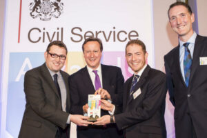 The Prime Minister with the Wood Review Report Team, the winners of the Supporting Enterprise and Growth Award