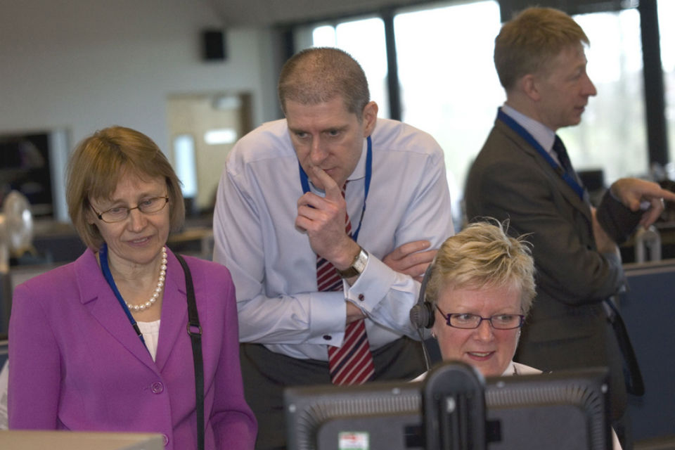 Picture of Lin Homer, Permanent Secretary at HMRC, speaking with staff