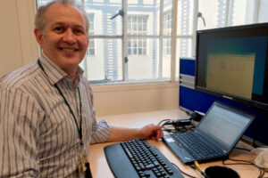 David Harris at his desk