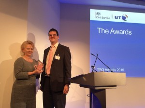 Olly Robbins awarding the People Award to DCLG