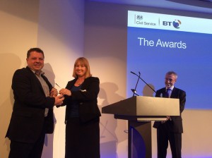 Julie Tankard presenting the Technology Award to MoJ