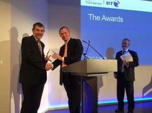 Bruce Mann presenting the  Corporate Leadership Award to DSTL