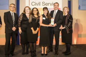Sir Simon presenting the Diversity Award to the Disability Confident Campaign Team, DWP