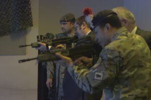 Jon Thompson (middle) shooting at the Reserves event