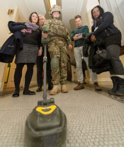 Civil servants meeting a Reserve mine-sweeping