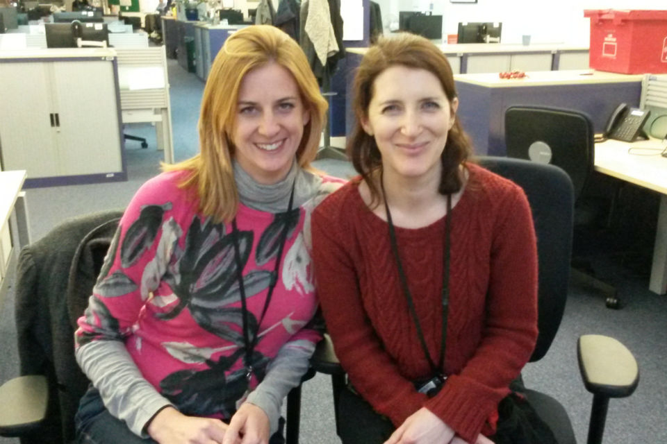 Photo of Susie Owen (l) and Deborah Brooks at their desk in the Cabinet Office