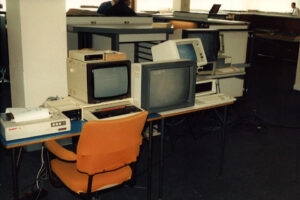 Orange chair in an office from the 80s