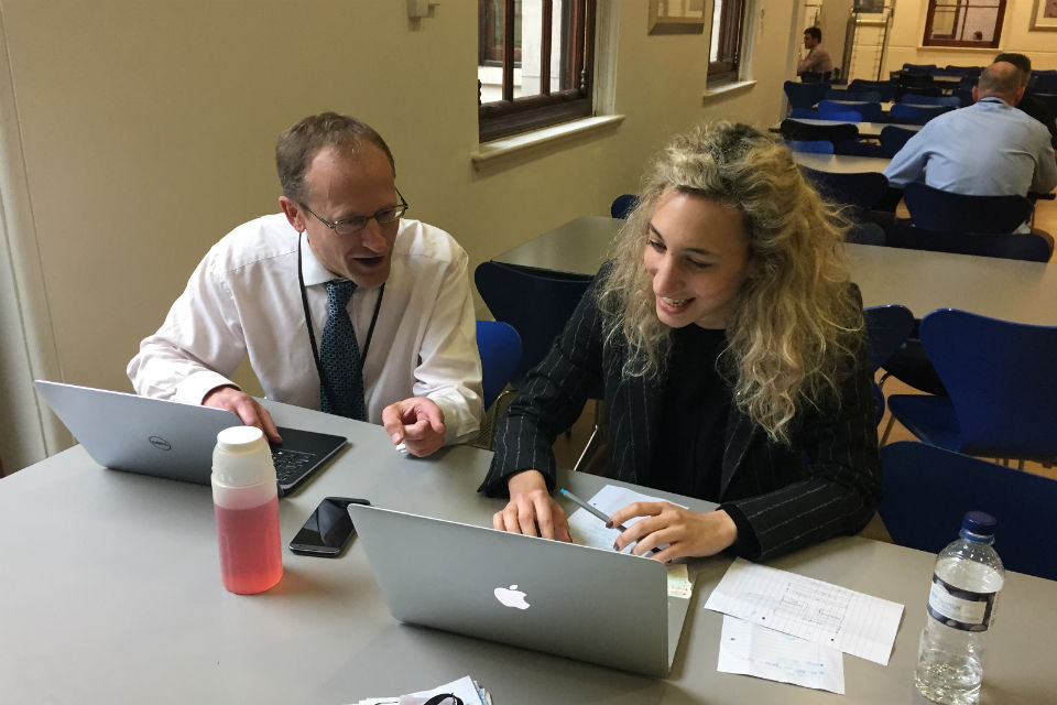 David Phillips and Ariana Demian of the GPU team working in the canteen in 1 Horse Guards