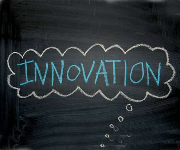 Blackboard with "innovation" drawn in a thought bubble in chalk