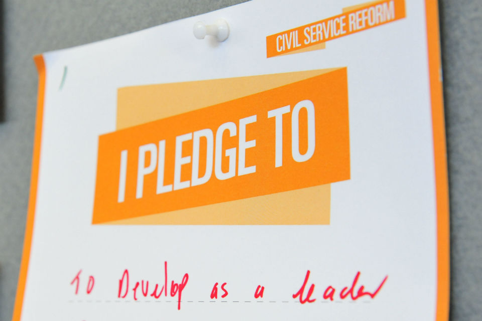 Civil Service Reform pledge card on which a civil servant has written - "To develop as a leader"