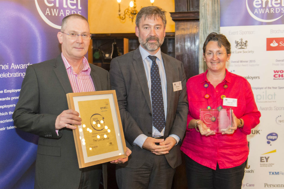 Paul Carswell & Janet Hill from the Civil Service Diversity & Inclusion team collect the Inclusive Culture Award - Public Sector