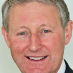 Head shot of Sir David Normington