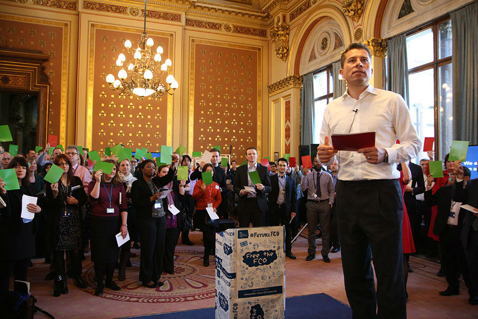 Former Ambassador Tom Fletcher and staff voting during an FCO Future event