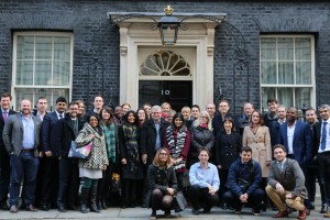 Group shot in front of door of No. 10 Downing Street.