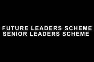 Leaders scheme titles in white type on black background divided by white line