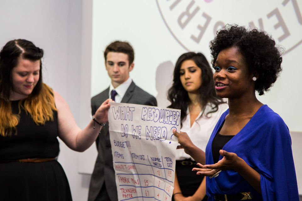 Young people making a public pitch