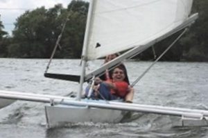 Man and woman in sailing boat