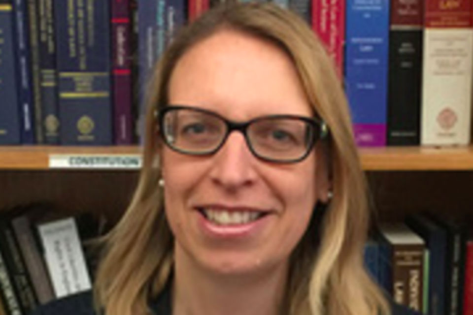 Head shot of Elizabeth Gardiner with glasses