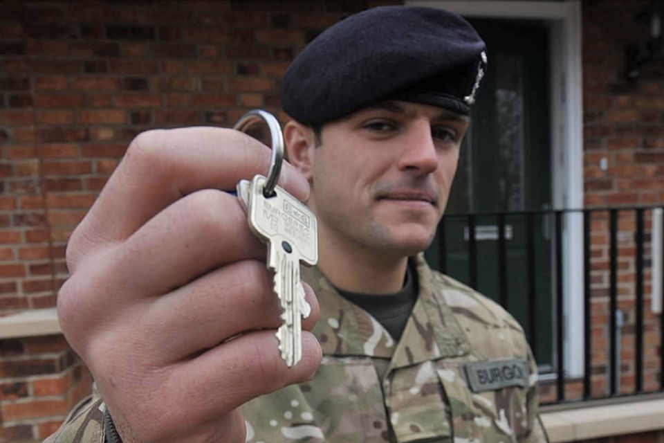 Soldier with keys to home - taken from Armed Forces Covenant Annual Report 2017