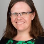 Headshot of woman in spectacles