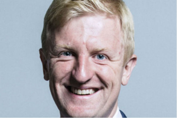 Head shot of Minister Oliver Dowden