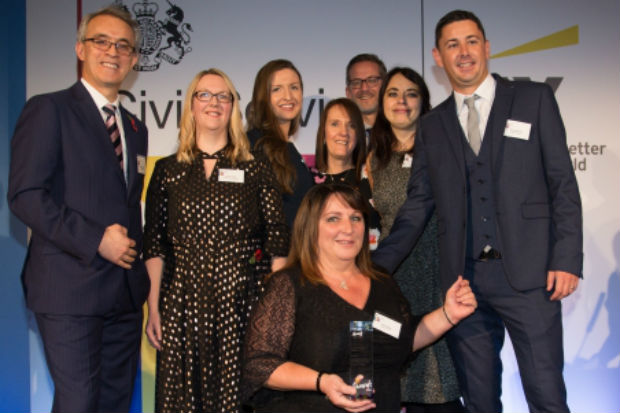 Group of men and women at Civil Service Awards ceremony