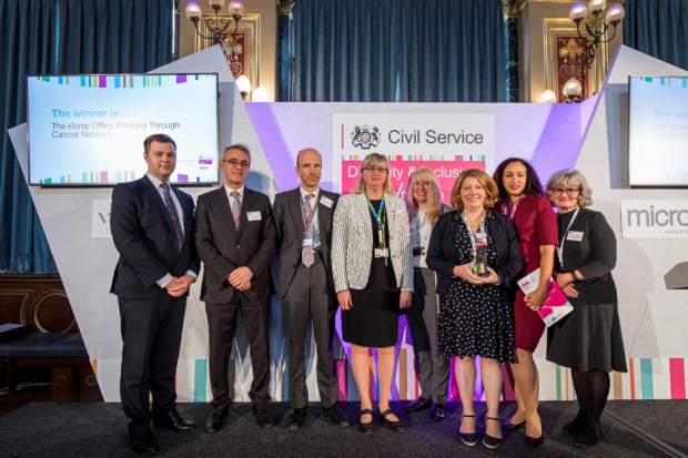 Ben Merrick with the winners of the Championing Disability Award at the Civil Service Diversity and Inclusion Awards 2019