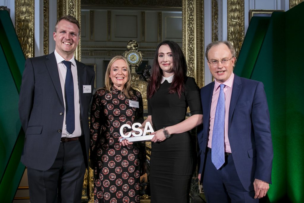 The Welsh Government winners of the Communication & Engagement Award, with award presenter Alex Aiken (right), Executive Director for Government Communications