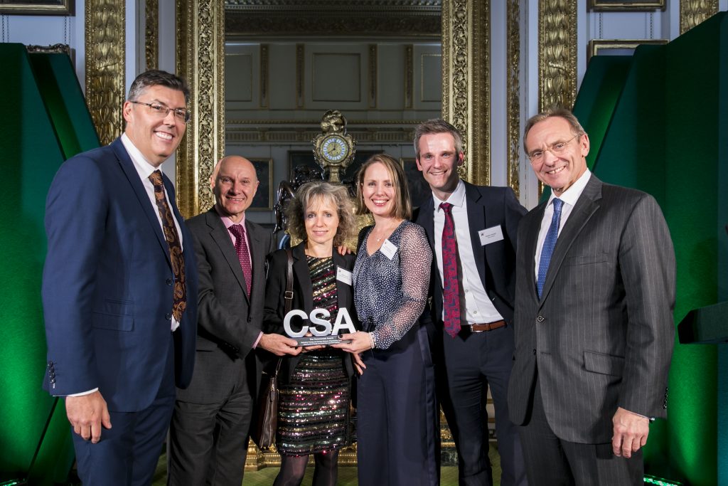 The DHSC winners of the Commercial Award, with award presenter John Manzoni, Chief Executive of the Civil Service & Permanent Secretary for the Cabinet Office