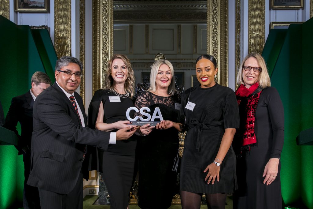 The Care Leaver Policy Team winners of the Developing People Award, with award presenter Elizabeth Gardiner (right), Permanent Secretary of the Government in Parliament Group in the Cabinet Office