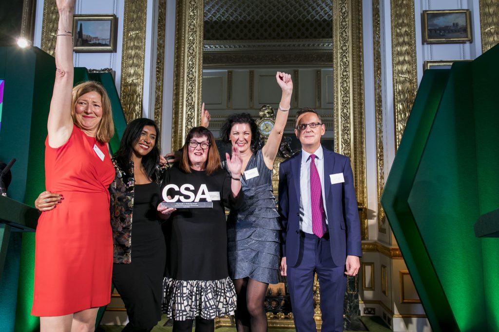 The Cabinet Office winners of the Health & Wellbeing Award, with award presenter Jonathan Jones, HM Procurator General, Treasury Solicitor and Head of the Government Legal Service