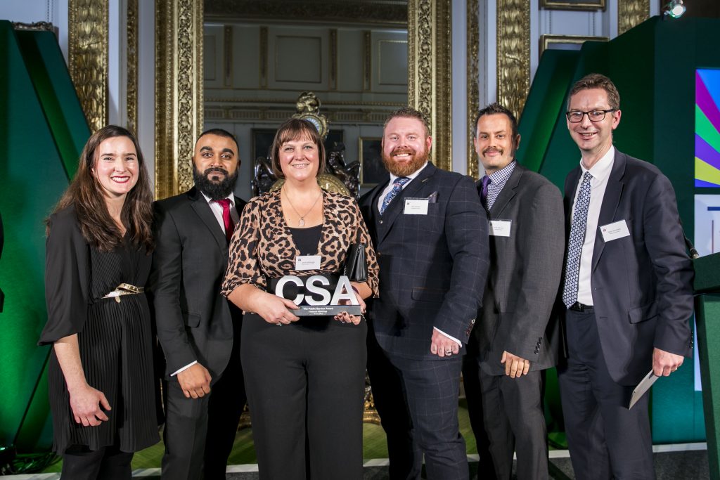 Members of the Midlands Intake Unit with their Public Service Award