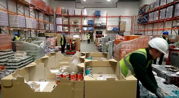 Boxes of essential supplies were packed at locations across the nation to get supplies to the needy