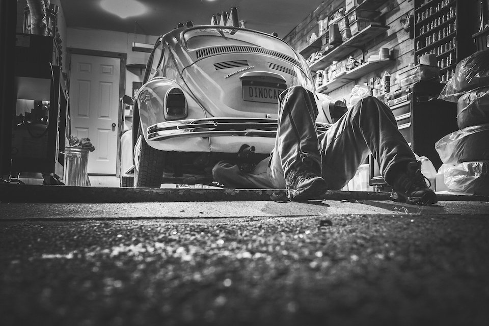 A man fixing his car