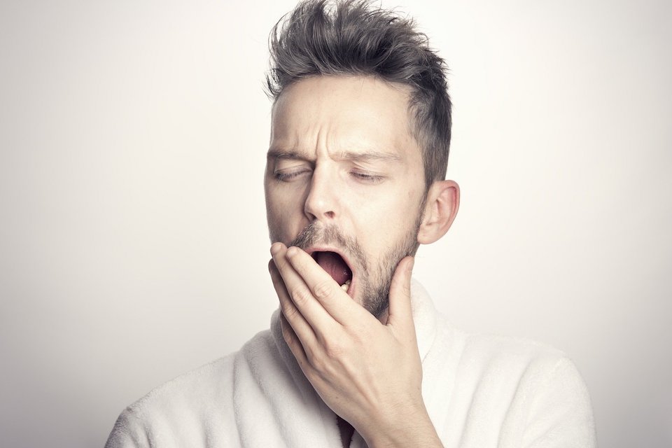 Image of a man yawning