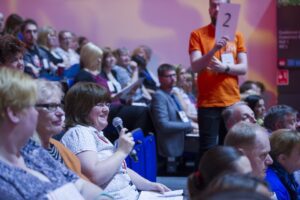 Woman asks a question at Civil Service Live in Glasgow