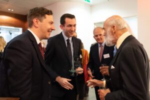 Matt Brown and Hugo Griffin meet Prince Michael of Kent after winning an award for the Civil Services Languages Network