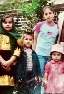 Rabia Nasimi, (in scarf) with her siblings