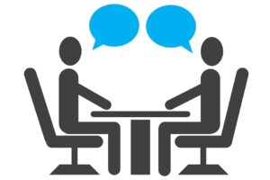 Image of two people in a job interview