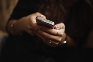 Image of hands holding a device intended to safeguard sex crime victims